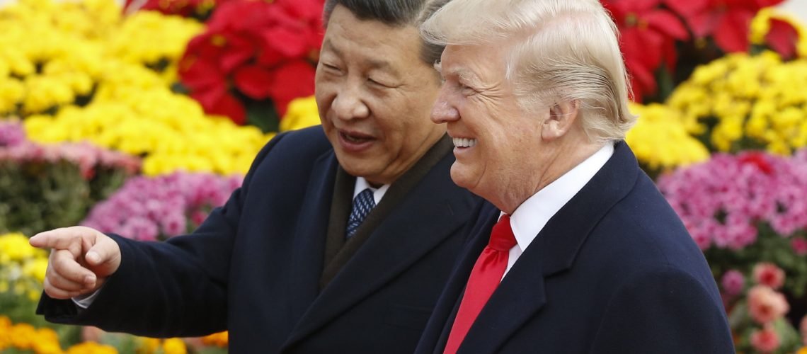 BEIJING, CHINA - NOVEMBER 9:  Chinese President Xi Jinping and U.S. President Donald Trump attend a welcoming ceremony November 9, 2017 in Beijing, China. Trump is on a 10-day trip to Asia.  (Photo by Thomas Peter-Pool/Getty Images)